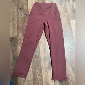 Yogalicious. Plum color. Very soft material. Capri length